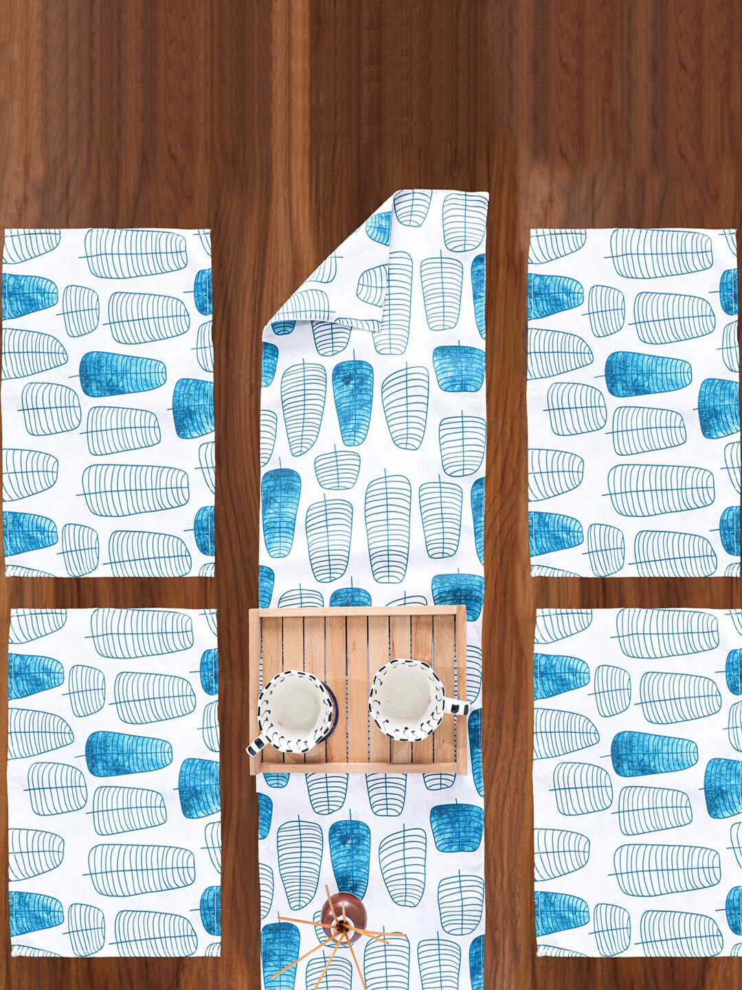 SPACES White & Blue 5 Pieces Abstract Printed Reversible Table Runner & Table Placemats
SPACES White & Blue 5 Pieces Abstract Printed Reversible Table Runner & Table Placemats