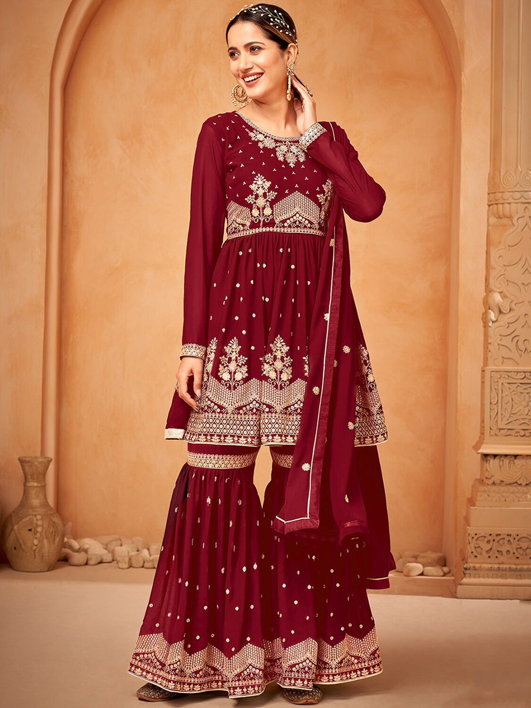 ODETTE Ethnic Motifs Embroidered Pleated Sequined Semi Stitched Kurti with Sharara Dupatta, Maroon
ODETTE Ethnic Motifs Embroidered Pleated Sequined Semi Stitched Kurti with Sharara Dupatta, Maroon