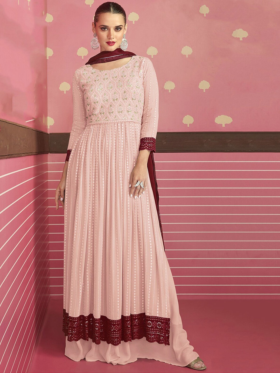ODETTE Ethnic Motifs Embroidered Mirror Work A-Line Pleated Kurta with Skirt & Dupatta, Peach
ODETTE Ethnic Motifs Embroidered Mirror Work A-Line Pleated Kurta with Skirt & Dupatta, Peach