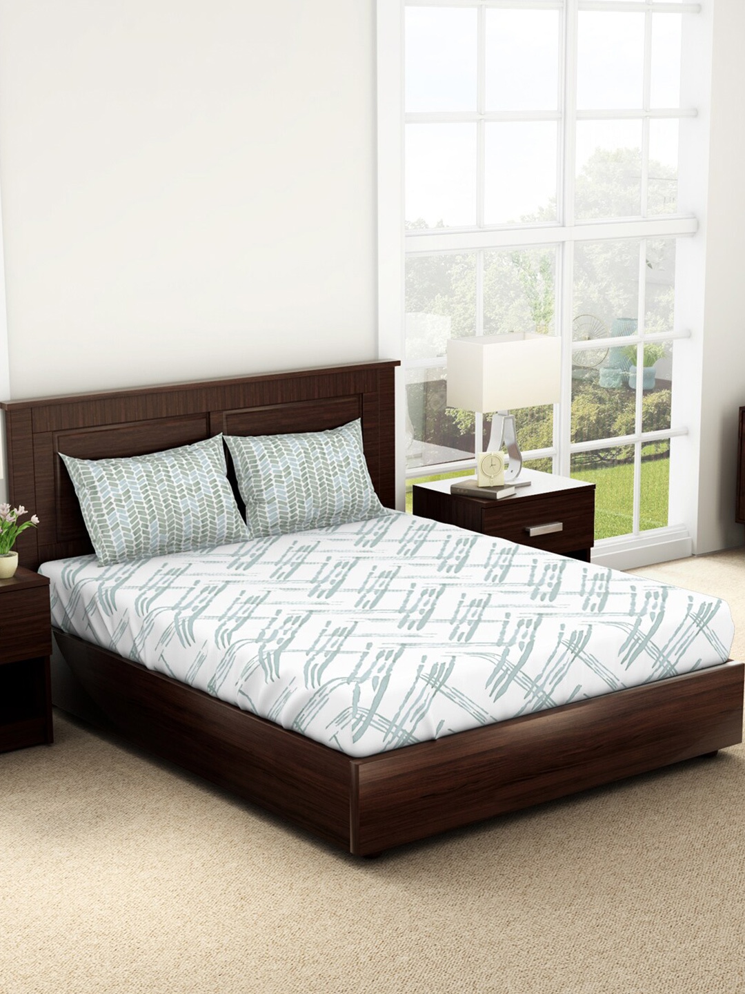 SPACES Geostance White & Blue Printed 144 TC Pure Cotton Queen Bedsheet & 2 Pillow Covers
SPACES Geostance White & Blue Printed 144 TC Pure Cotton Queen Bedsheet & 2 Pillow Covers