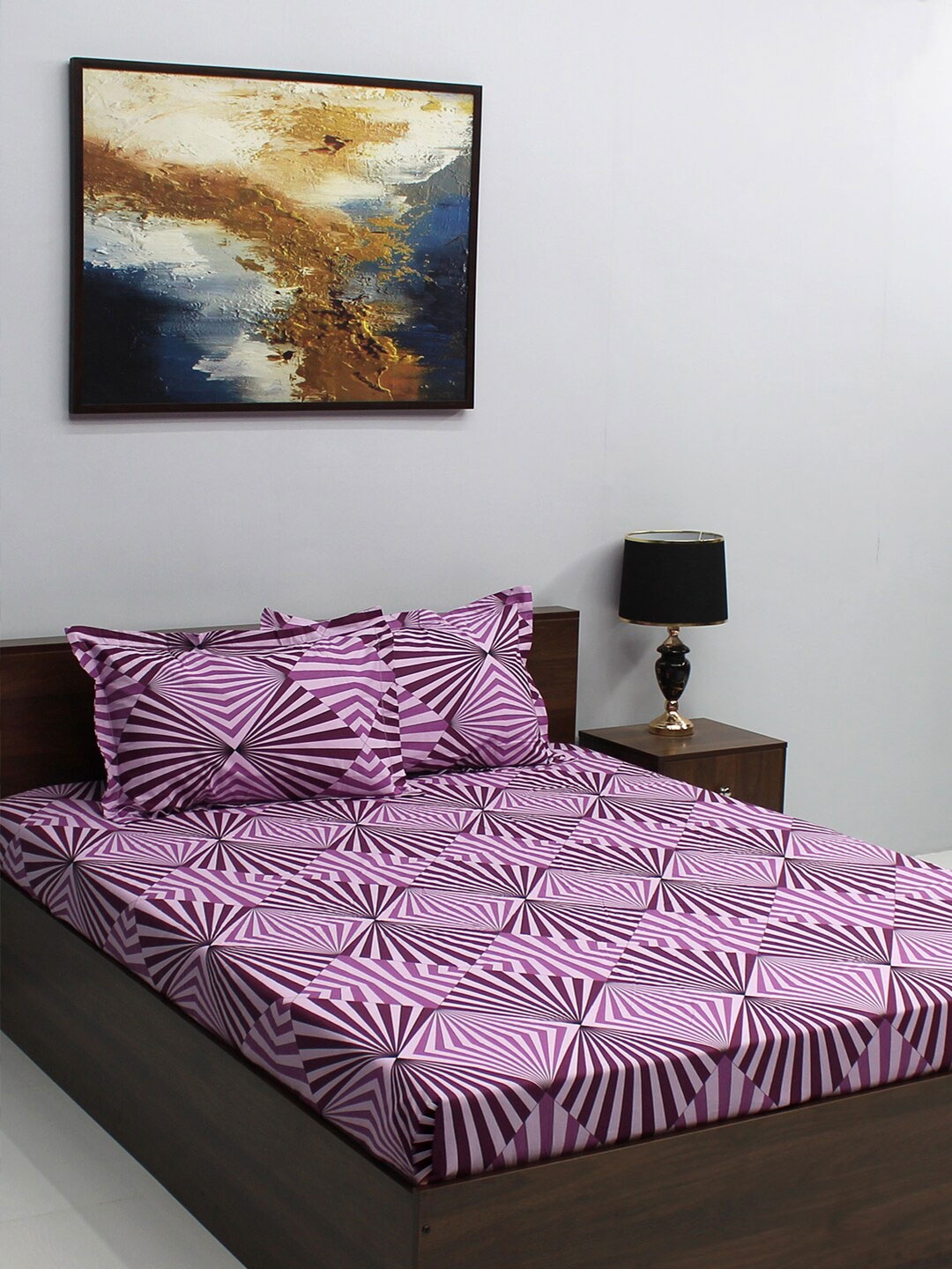 BOMBAY DYEING Epigram Purple & Brown Printed Cotton 120TC King Bedsheet & 2 Pillow Covers
BOMBAY DYEING Epigram Purple & Brown Printed Cotton 120TC King Bedsheet & 2 Pillow Covers