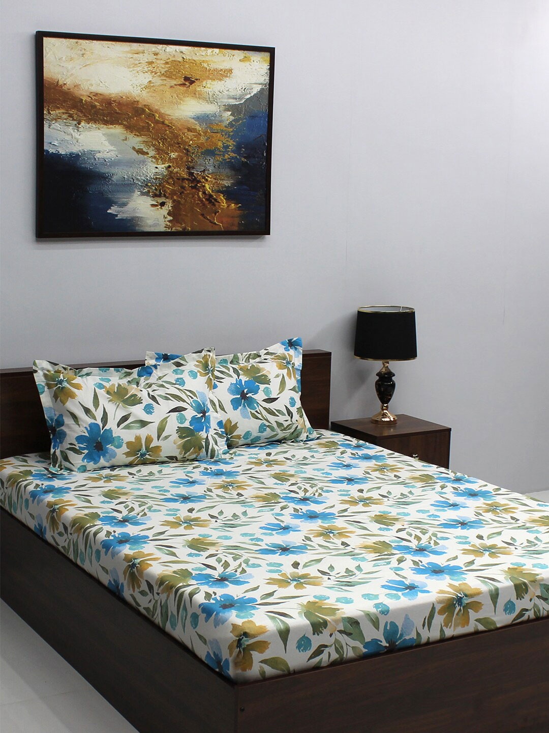 BOMBAY DYEING Epigram White & Blue Floral Cotton 120TC Queen Bedsheet With 2 Pillow Covers
BOMBAY DYEING Epigram White & Blue Floral Cotton 120TC Queen Bedsheet With 2 Pillow Covers