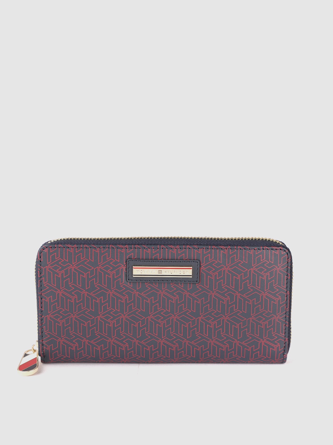 Tommy Hilfiger Women Geometric Printed Embellished Leather Zip Around Wallet, Navy blue
Tommy Hilfiger Women Geometric Printed Embellished Leather Zip Around Wallet, Navy blue