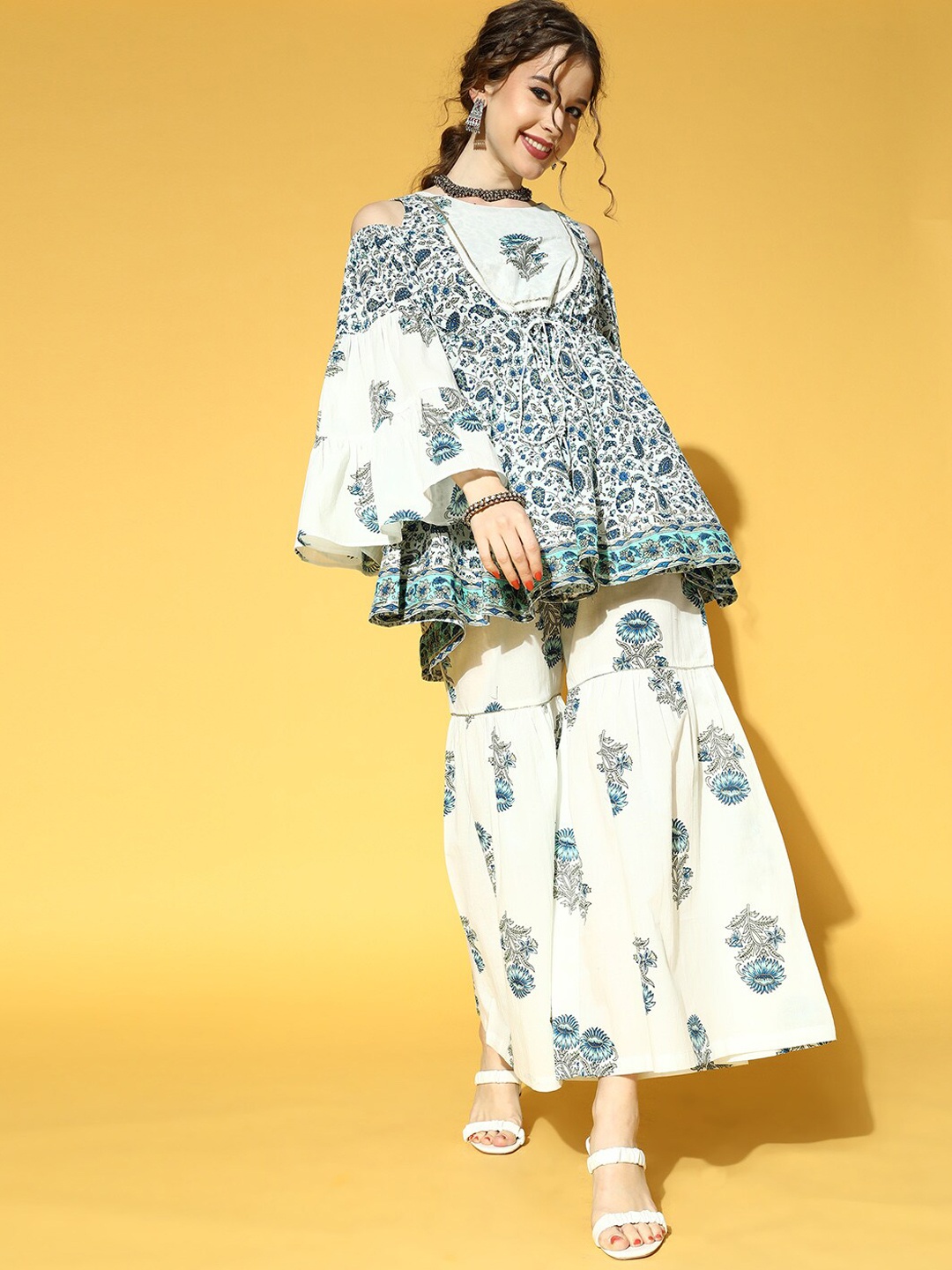 Yufta Teal & White Floral Printed Pure Cotton Kurti with Sharara With Gotta Patii Details
Yufta Teal & White Floral Printed Pure Cotton Kurti with Sharara With Gotta Patii Details