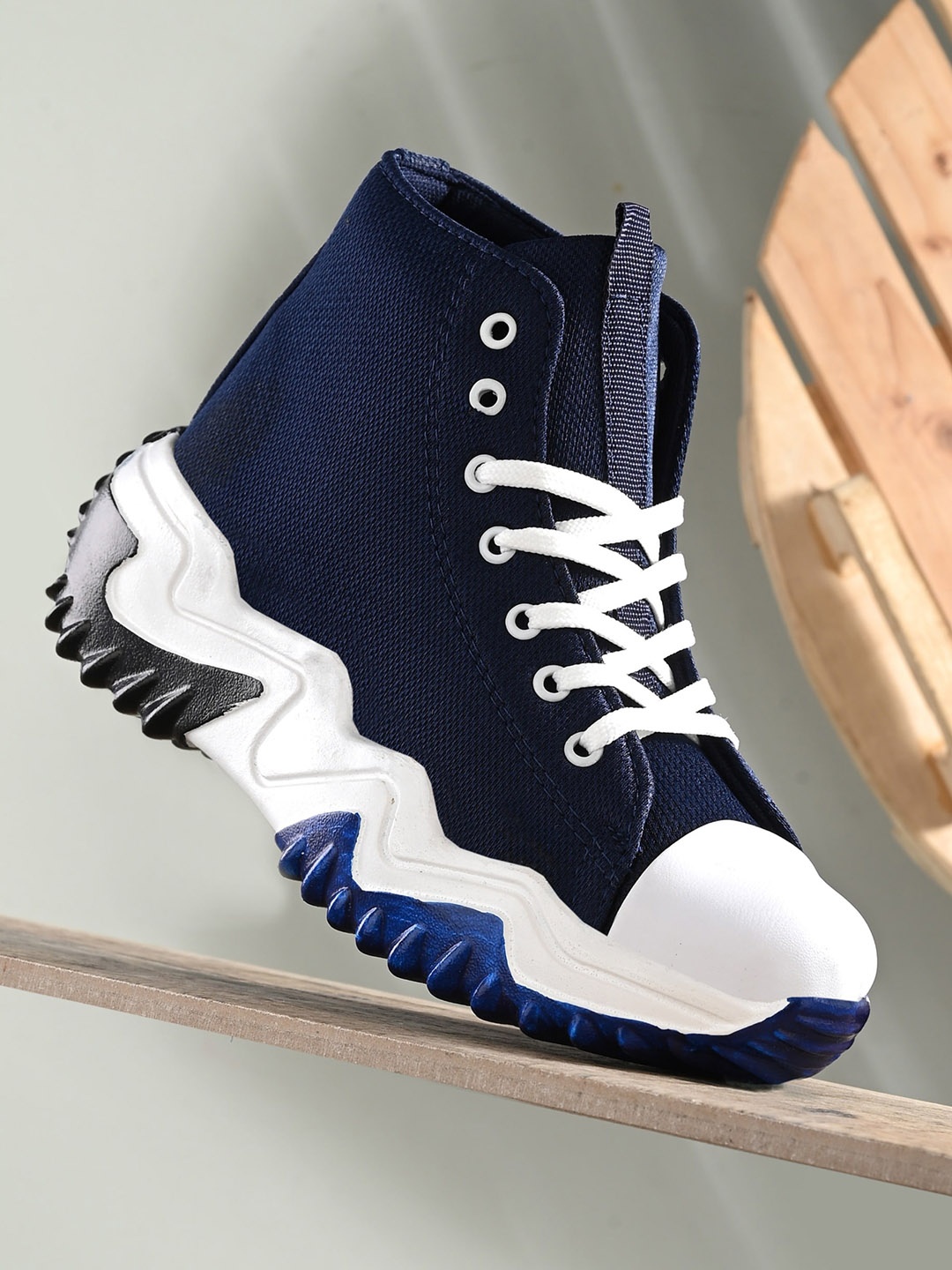 Kook N Keech Women Navy Blue & White Mid Top Textile Padded Insole Contrast Sole Sneakers
Kook N Keech Women Navy Blue & White Mid Top Textile Padded Insole Contrast Sole Sneakers