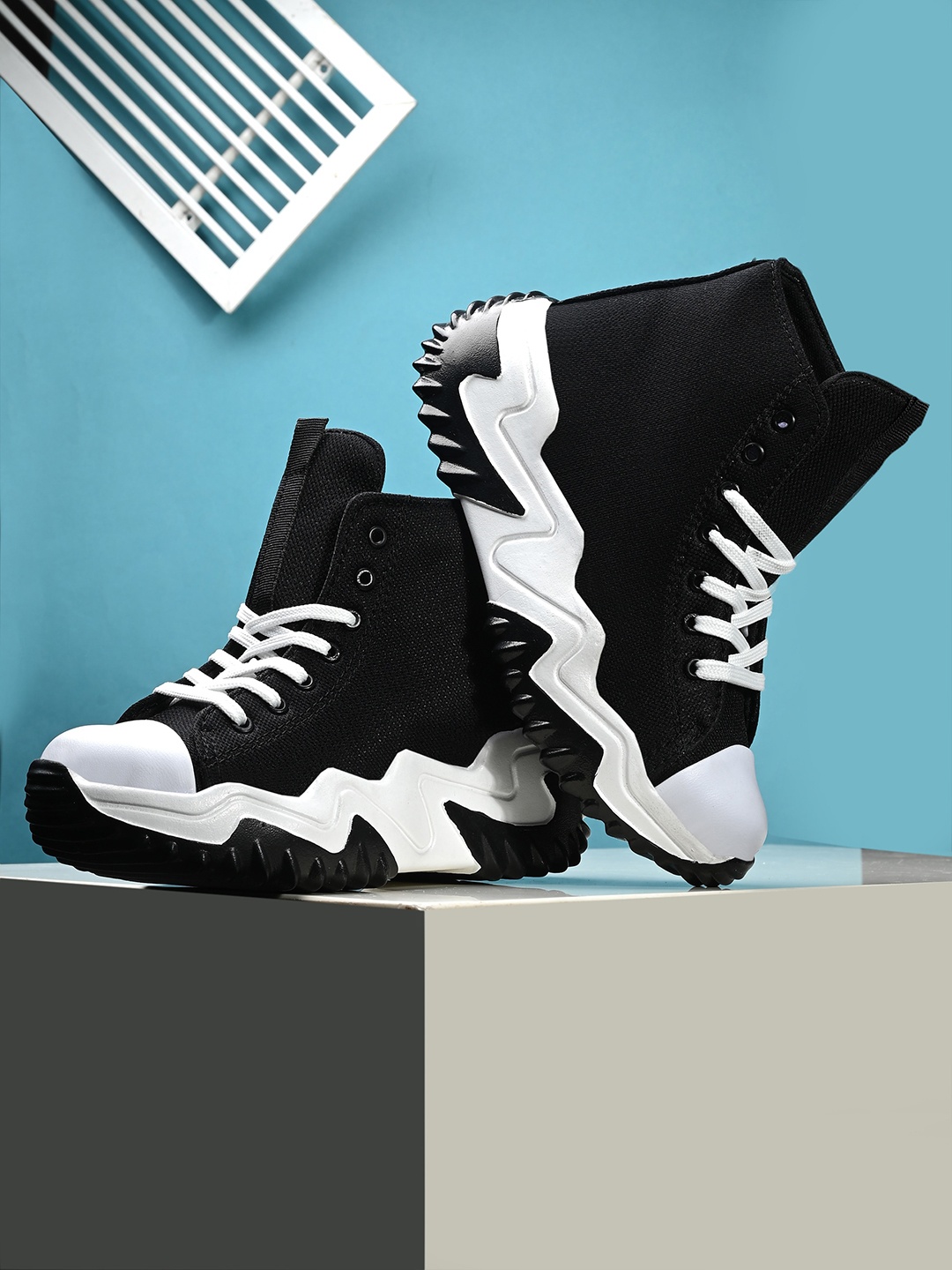 Kook N Keech Women Black & White Mid Top Textile Padded Insole Contrast Sole Sneakers
Kook N Keech Women Black & White Mid Top Textile Padded Insole Contrast Sole Sneakers