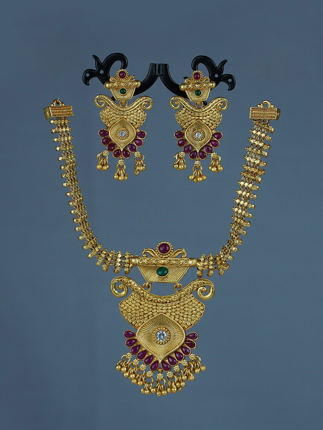 Diksha collection Gold-Plated Stones-Studded & Beaded Matte Finish Antique Jewellery Set
Diksha collection Gold-Plated Stones-Studded & Beaded Matte Finish Antique Jewellery Set