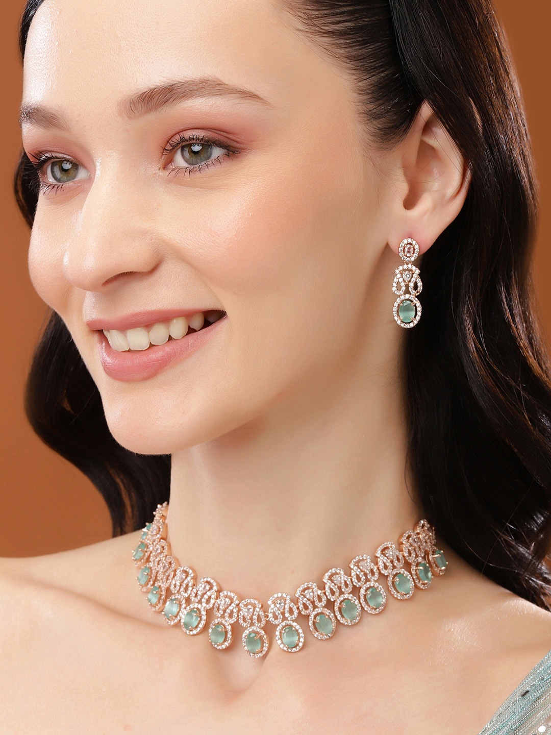 Estele Rose Gold Plated CZ Sparkling Necklace Set with Mint Green Crystals for Women
Estele Rose Gold Plated CZ Sparkling Necklace Set with Mint Green Crystals for Women