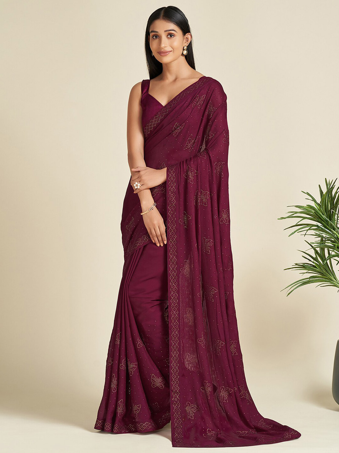 Mitera Purple & Gold-Toned Embellished Satin Saree 
Mitera Purple & Gold-Toned Embellished Satin Saree