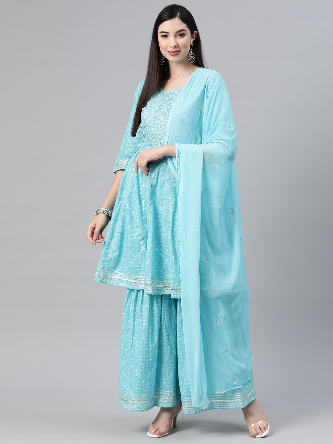 Readiprint Fashions Floral Printed Sequinned Pure Cotton Kurta With Sharara & Dupatta, Blue
Readiprint Fashions Floral Printed Sequinned Pure Cotton Kurta With Sharara & Dupatta, Blue