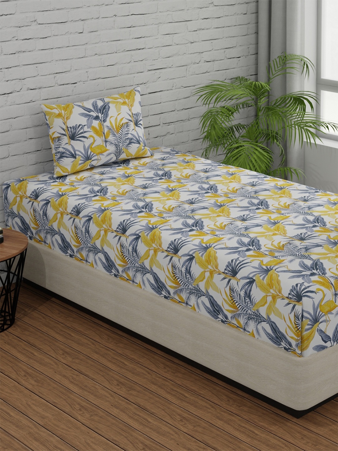 Huesland Comfort Yellow & White Floral 144 TC Cotton Single Bedsheet with 1 Pillow Cover
Huesland Comfort Yellow & White Floral 144 TC Cotton Single Bedsheet with 1 Pillow Cover