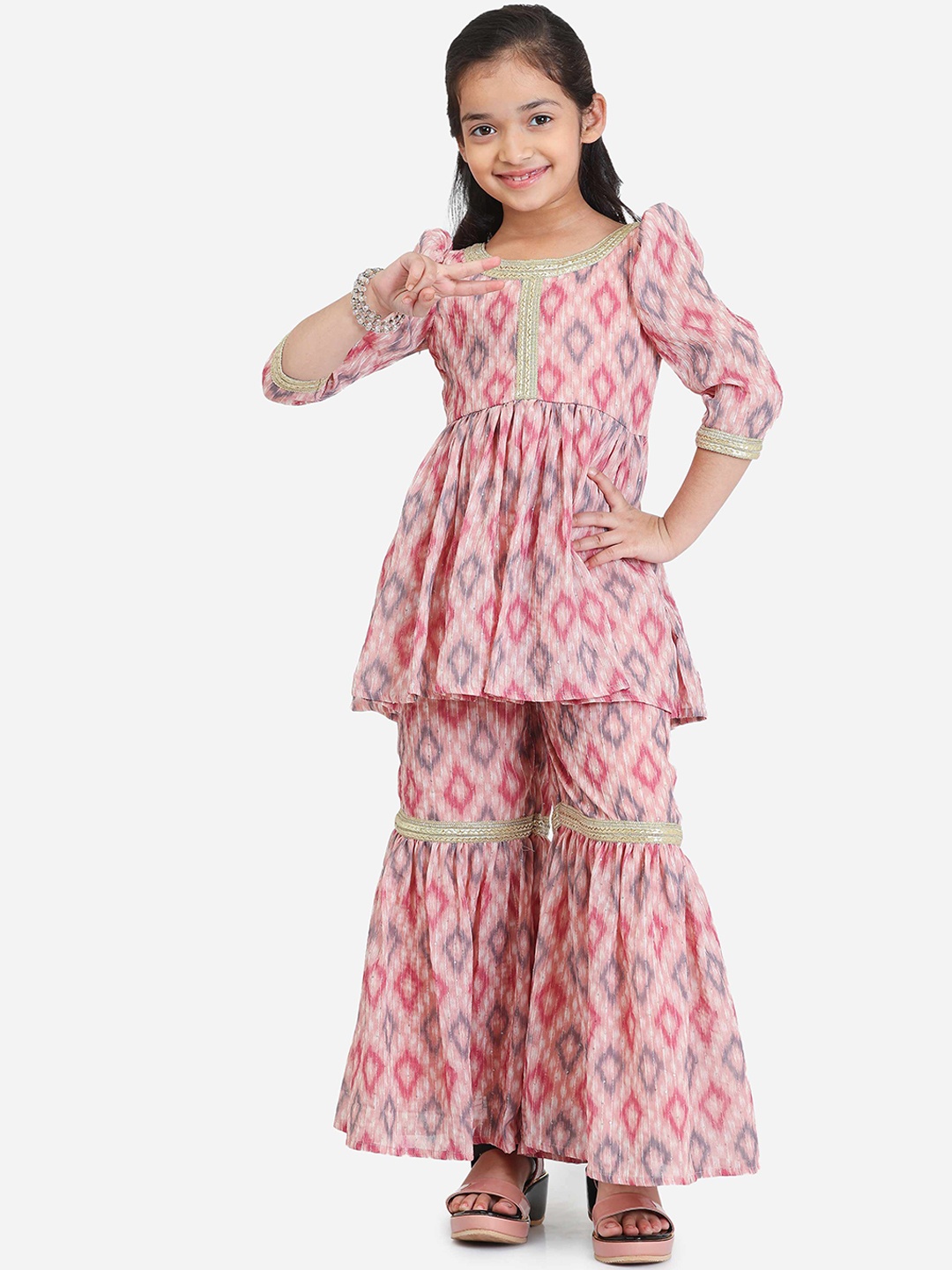 Ethnovog Girls Abstract Printed Sequined Puff Sleeves A-Line Kurti with Sharara, Pink
Ethnovog Girls Abstract Printed Sequined Puff Sleeves A-Line Kurti with Sharara, Pink