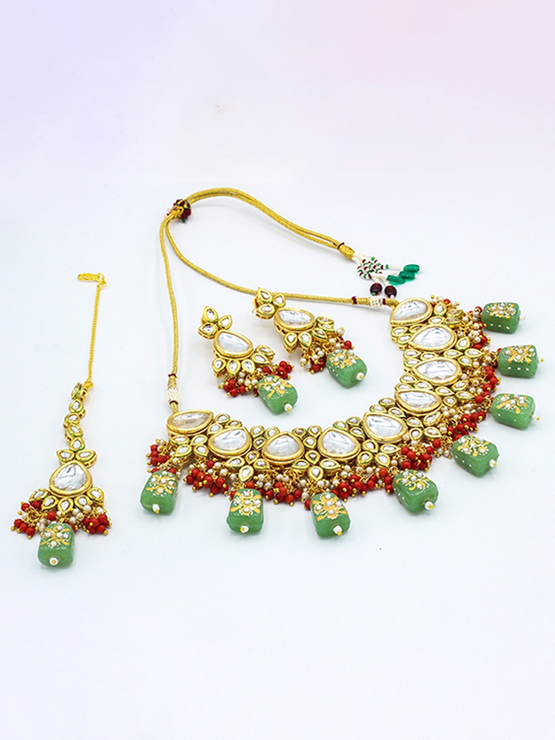 AASHISH IMITATION Gold-Plated Kundan-Studded & Beaded Jewellery Set With Maangtika
AASHISH IMITATION Gold-Plated Kundan-Studded & Beaded Jewellery Set With Maangtika