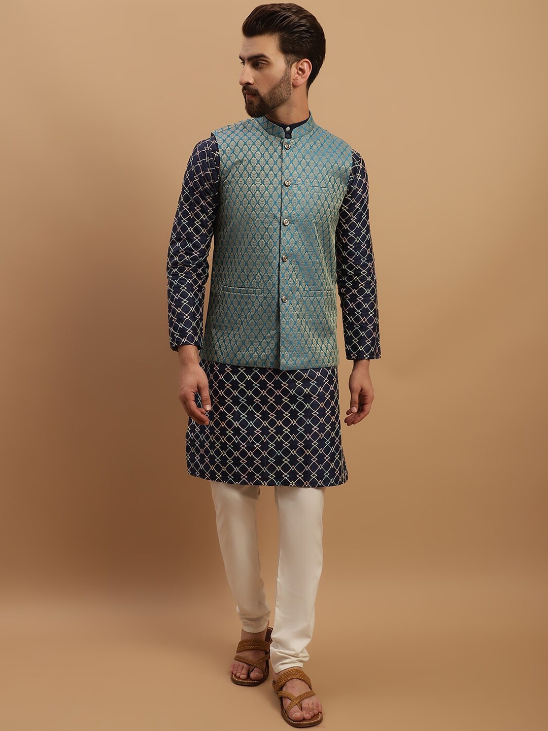 SOJANYA Geometric Embroidered Regular Kurta with Churidar & Woven Design Nehru Jacket, Navy blue
SOJANYA Geometric Embroidered Regular Kurta with Churidar & Woven Design Nehru Jacket, Navy blue