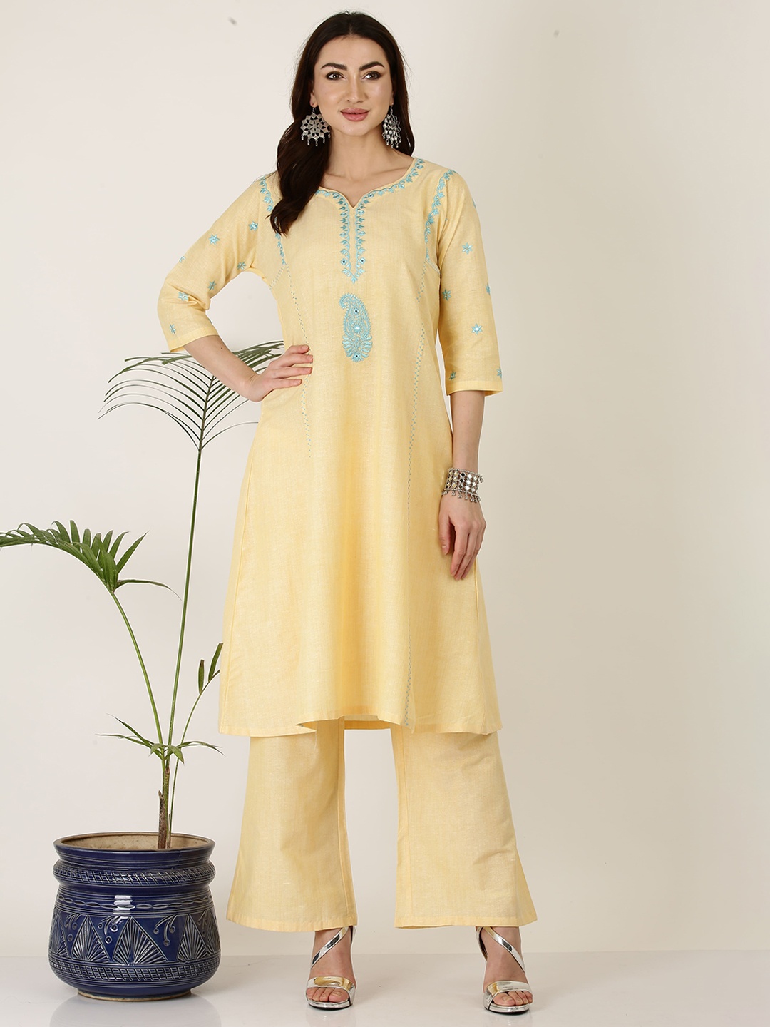 KAANCHIE NANGGIA Ethnic Motifs Embroidered Mirror Work A-Line Kurta with Palazzos, Yellow
KAANCHIE NANGGIA Ethnic Motifs Embroidered Mirror Work A-Line Kurta with Palazzos, Yellow