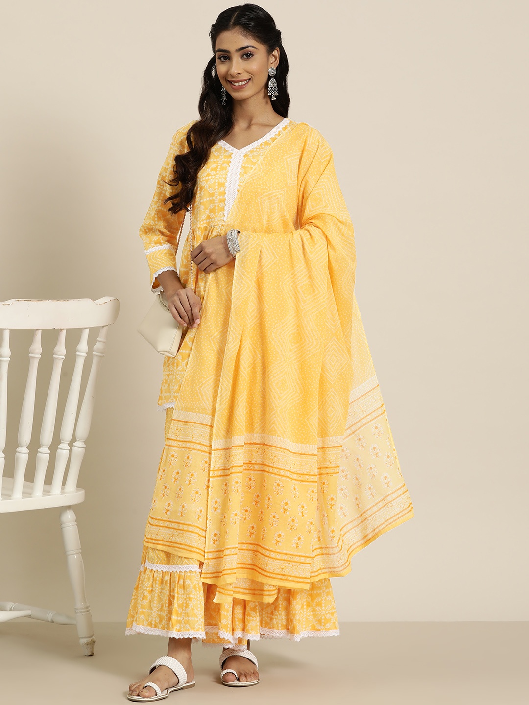 HERE&NOW Women Yellow Ethnic Motifs Printed Regular Pure Cotton Kurta with Sharara & With Dupatta
HERE&NOW Women Yellow Ethnic Motifs Printed Regular Pure Cotton Kurta with Sharara & With Dupatta