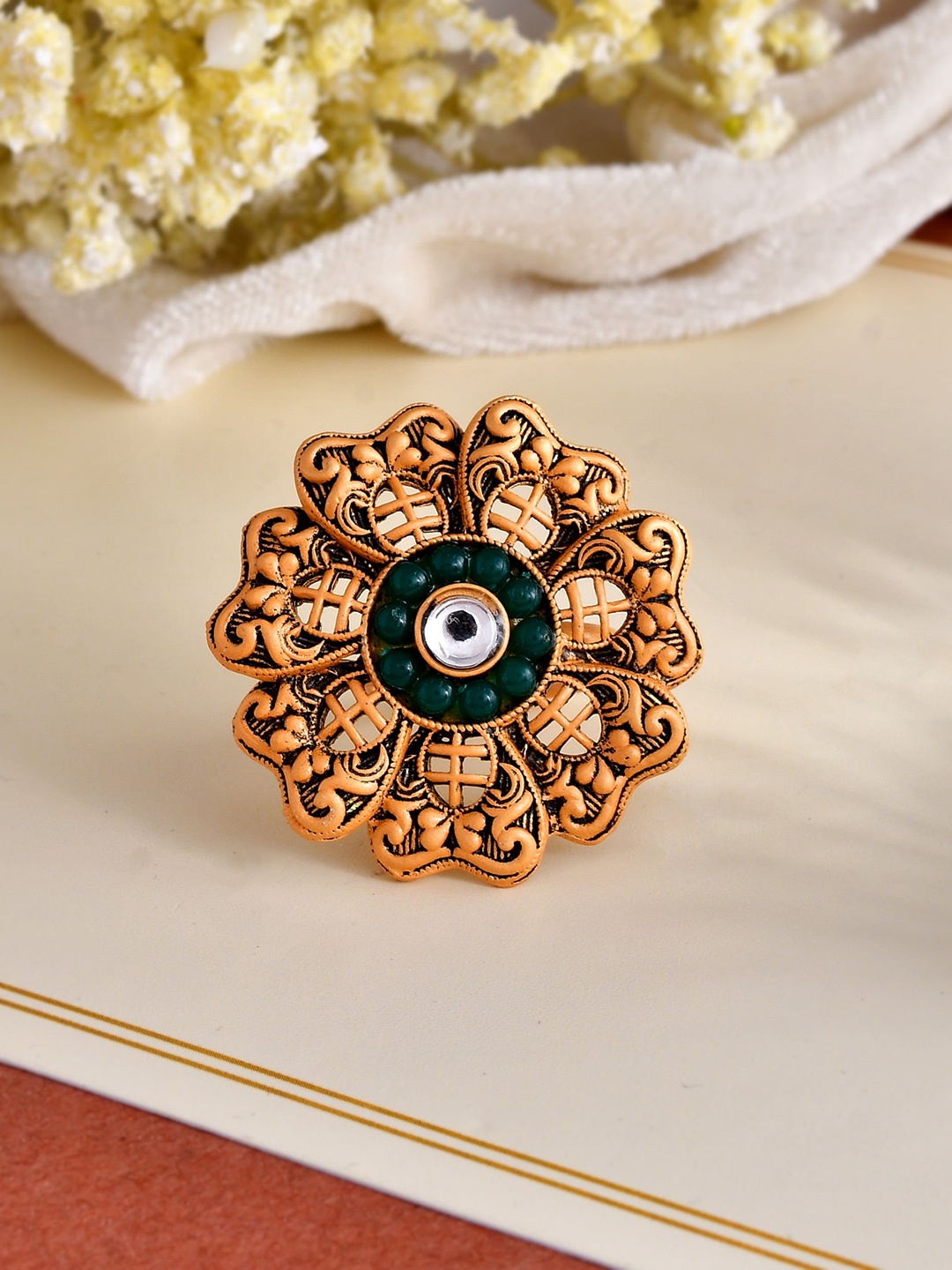 Silvermerc Designs Gold-Plated & Stone-Studded Floral South Indian Adjustable Finger Ring
Silvermerc Designs Gold-Plated & Stone-Studded Floral South Indian Adjustable Finger Ring