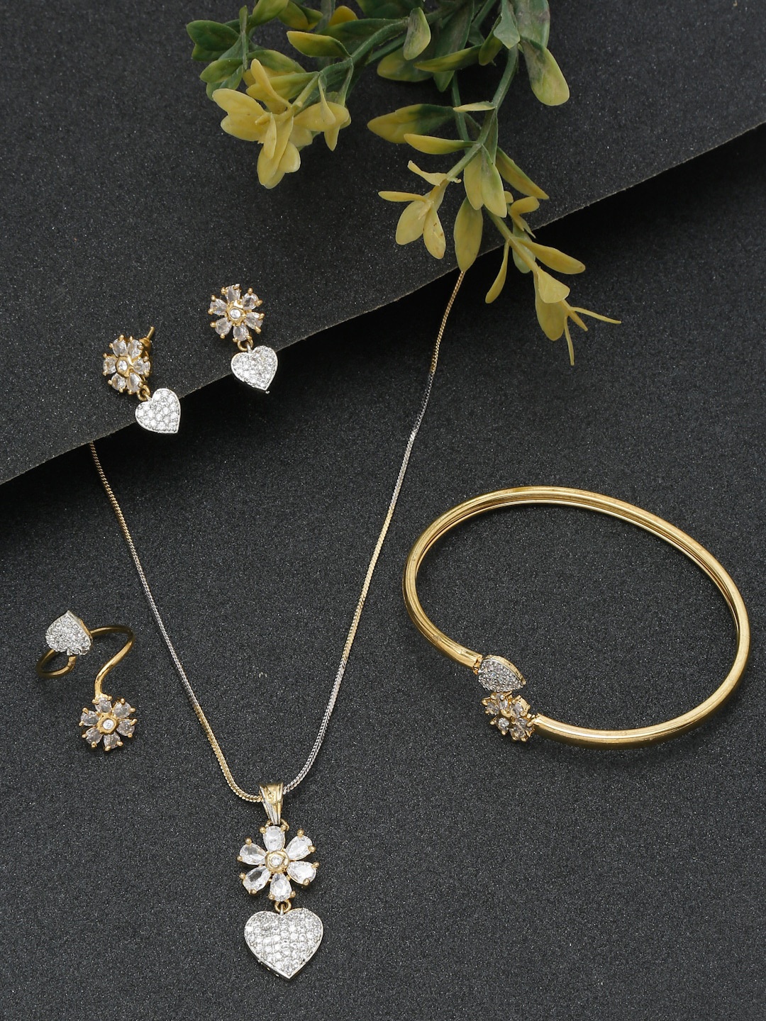 DressBerry Gold-Plated Cubic Zirconia Stone-Studded Jewellery Set With Bracelet & Ring
DressBerry Gold-Plated Cubic Zirconia Stone-Studded Jewellery Set With Bracelet & Ring