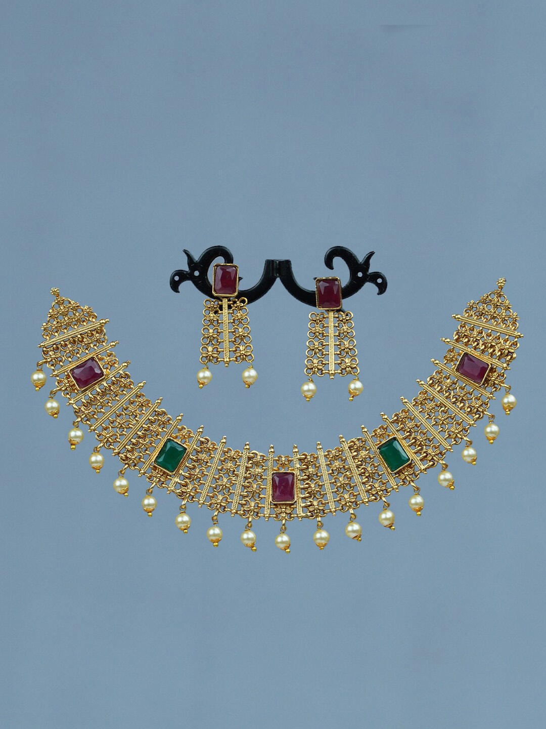Diksha collection Gold-Plated Stone-Studded & Pearl Beaded Matte Finish Jewellery Set
Diksha collection Gold-Plated Stone-Studded & Pearl Beaded Matte Finish Jewellery Set
