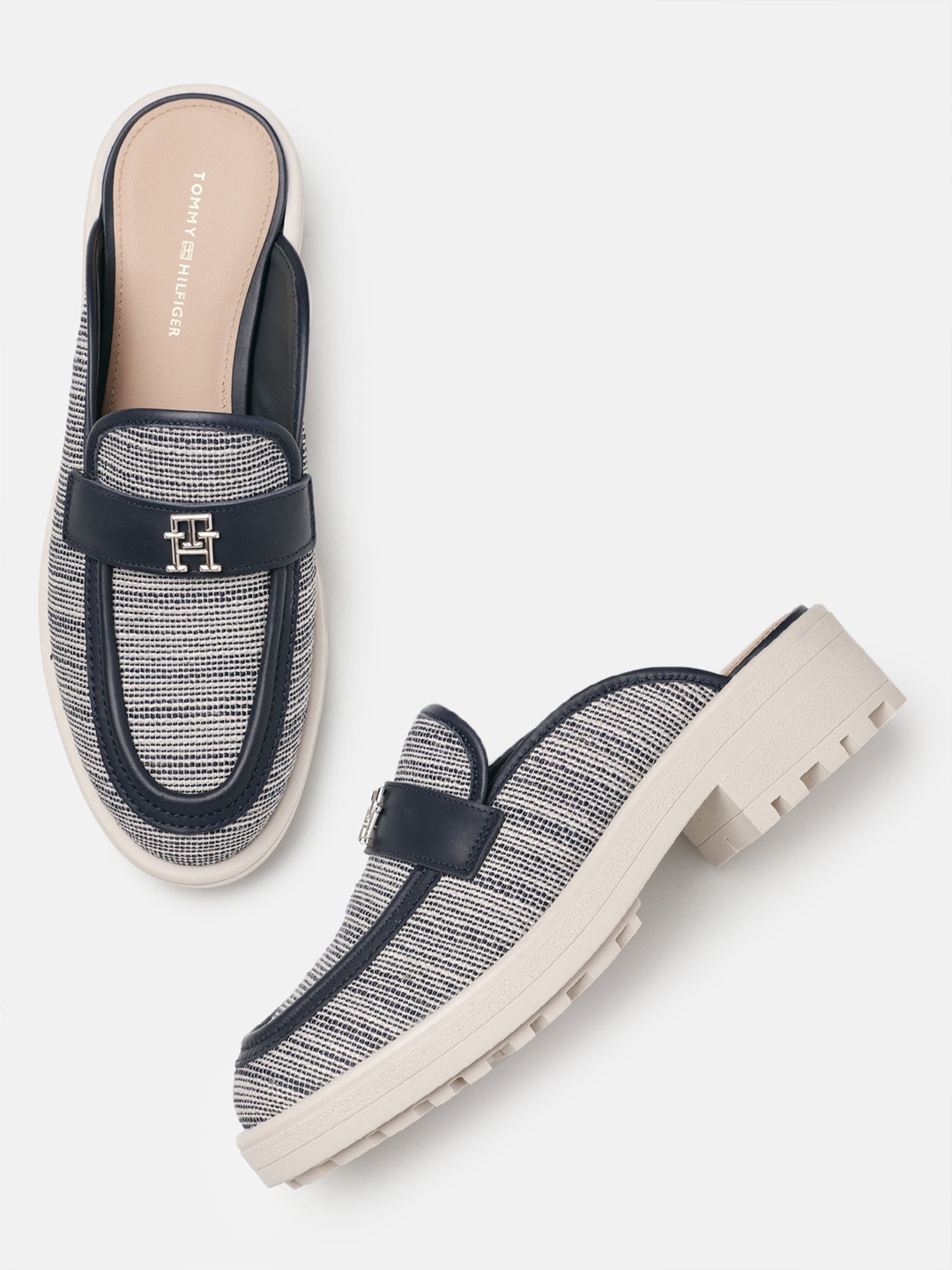 Tommy Hilfiger Women Woven Textured Block Mules With Brand Logo Buckle Detail, Navy blue
Tommy Hilfiger Women Woven Textured Block Mules With Brand Logo Buckle Detail, Navy blue