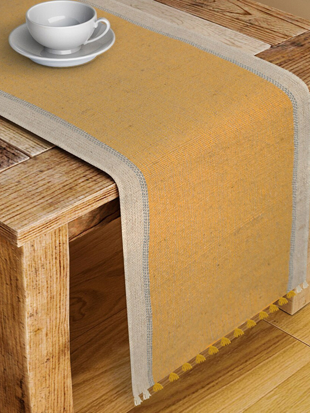 Fabindia Yellow Woven Design Tapish Cotton Rectangular Table Runner 
Fabindia Yellow Woven Design Tapish Cotton Rectangular Table Runner