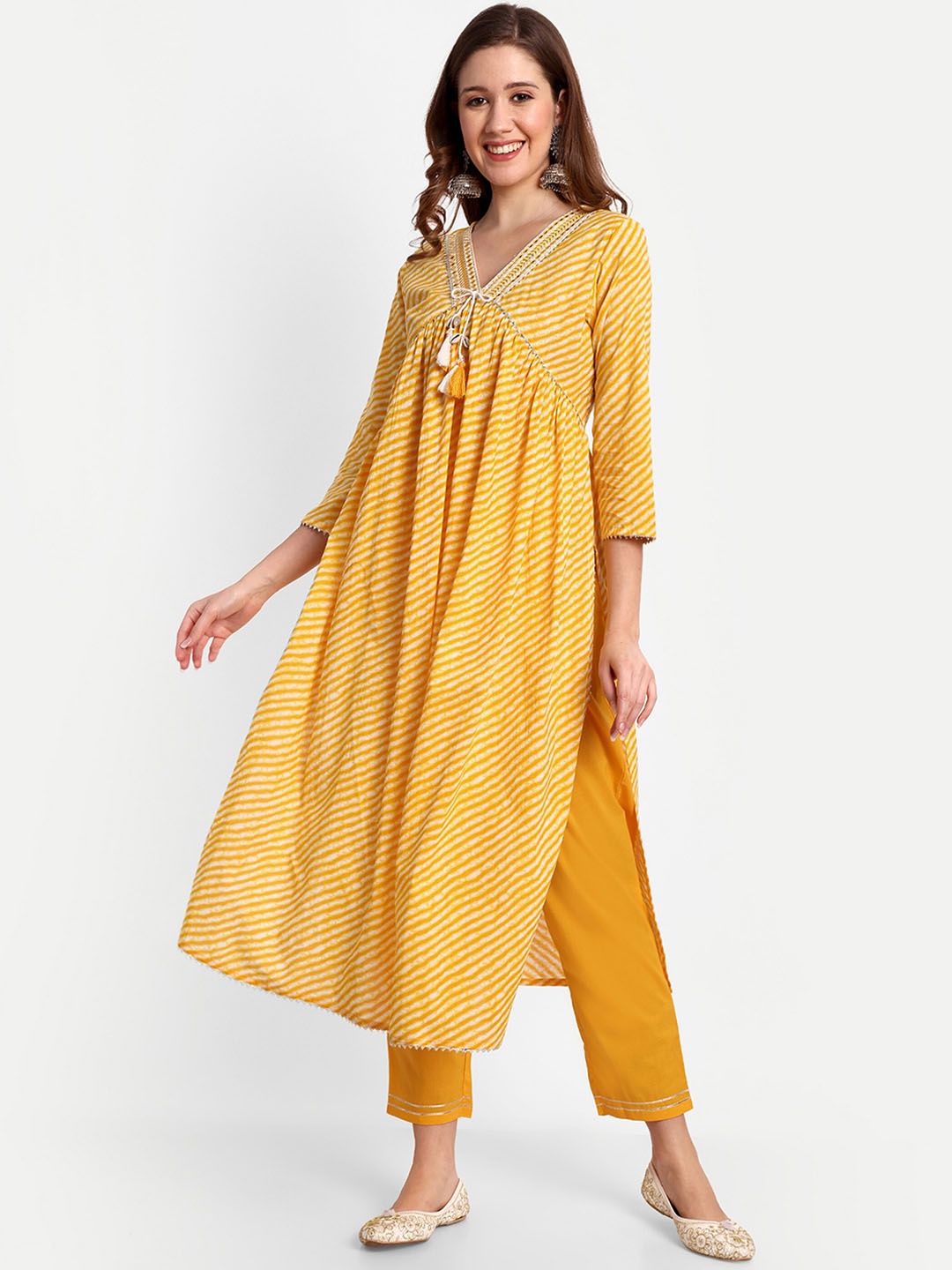 NH KAPDEWALA Women Yellow Printed Empire Mirror Work Pure Cotton Kurti with Trousers
NH KAPDEWALA Women Yellow Printed Empire Mirror Work Pure Cotton Kurti with Trousers