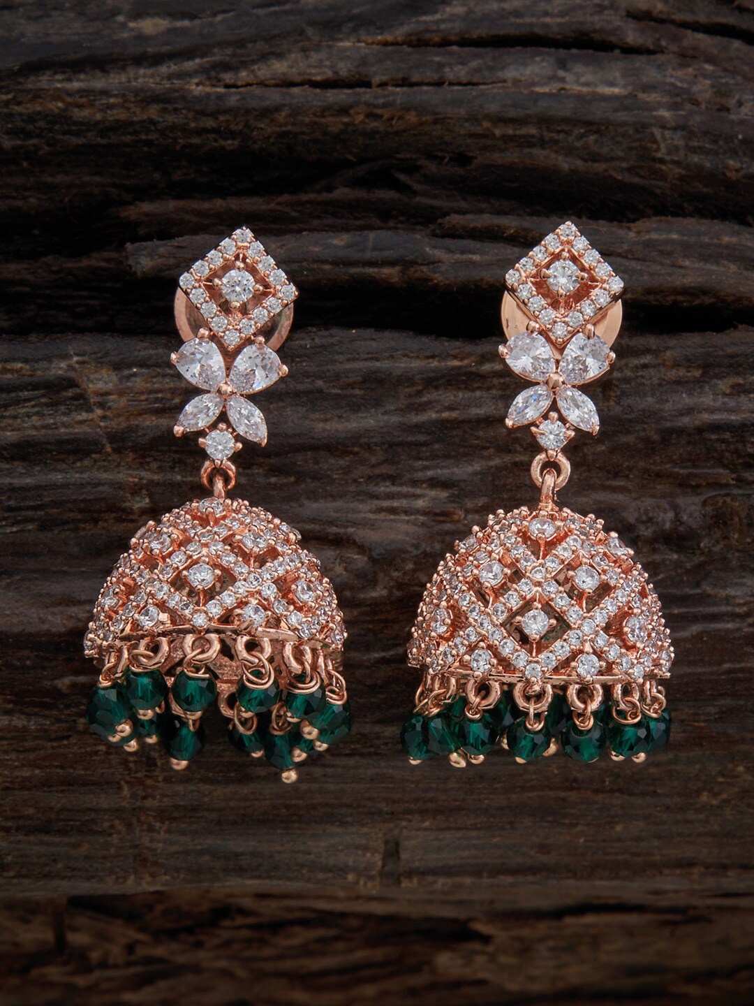 Kushal's Fashion Jewellery Rose Gold-Plated Cubic Zirconia Studded Dome Shaped Jhumkas
Kushal's Fashion Jewellery Rose Gold-Plated Cubic Zirconia Studded Dome Shaped Jhumkas