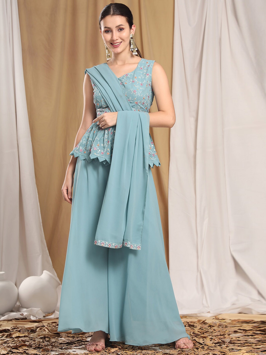 KALINI Women Blue Ethnic Motifs Embroidered Regular Thread Work Top with Palazzos & With Dupatta
KALINI Women Blue Ethnic Motifs Embroidered Regular Thread Work Top with Palazzos & With Dupatta