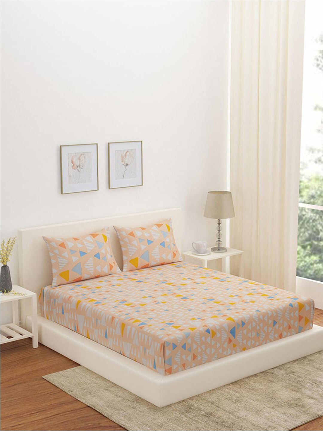 Athome by Nilkamal Aurora Eden Peach-Coloured Geometric 180 TC Fitted Queen Bedsheet
Athome by Nilkamal Aurora Eden Peach-Coloured Geometric 180 TC Fitted Queen Bedsheet