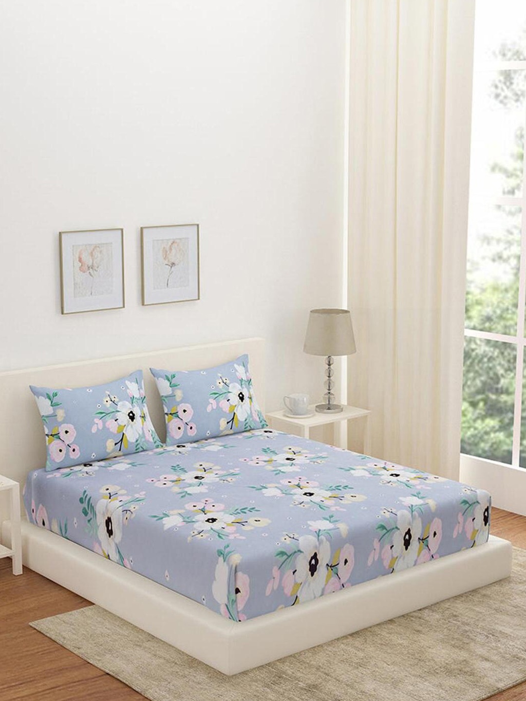 Athome by Nilkamal Aurora Sonata Blue Floral 180 TC Fitted Queen Bedsheet & Pillow Covers
Athome by Nilkamal Aurora Sonata Blue Floral 180 TC Fitted Queen Bedsheet & Pillow Covers