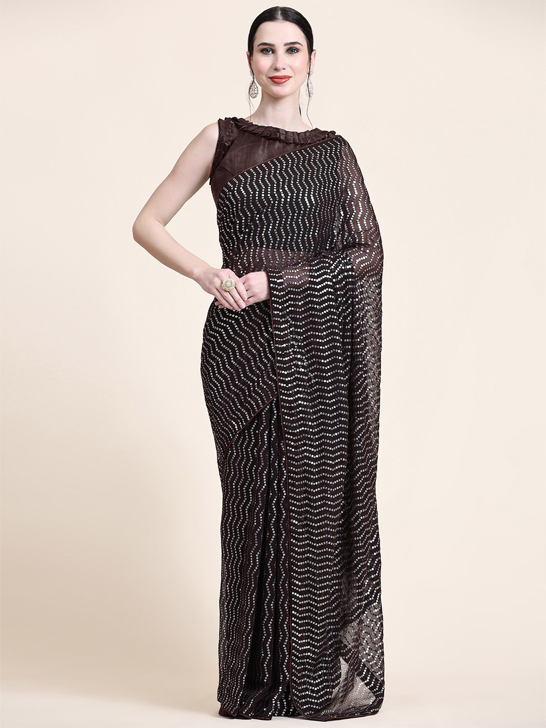 Mitera Coffee Brown Embellished Sequinned Pure Georgette Saree 
Mitera Coffee Brown Embellished Sequinned Pure Georgette Saree