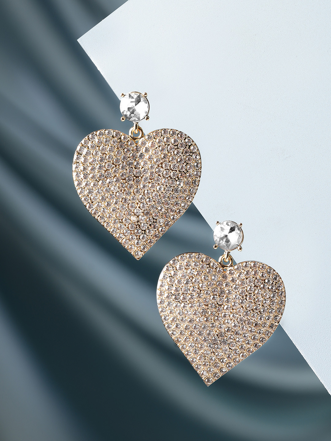 Rubans Voguish Gold-Plated Zircon Studded Heart Shaped Drop Earrings
Rubans Voguish Gold-Plated Zircon Studded Heart Shaped Drop Earrings