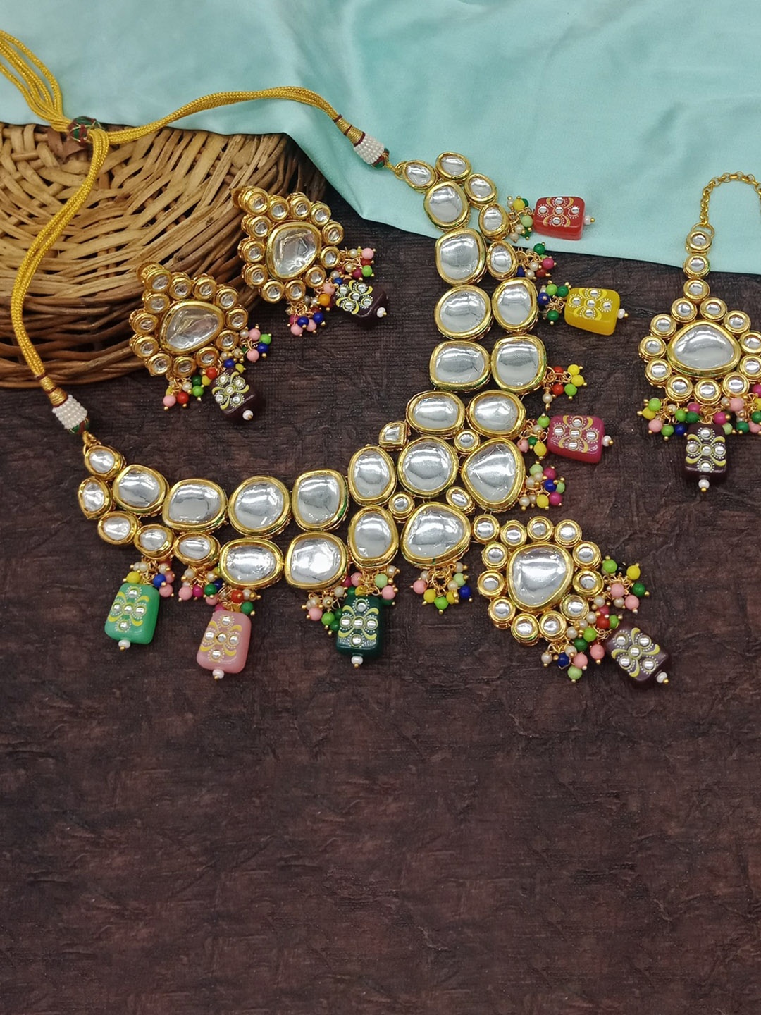 AASHISH IMITATION Gold-Plated Kundan Studded & Beaded Jewellery Set With Maang Tikka
AASHISH IMITATION Gold-Plated Kundan Studded & Beaded Jewellery Set With Maang Tikka