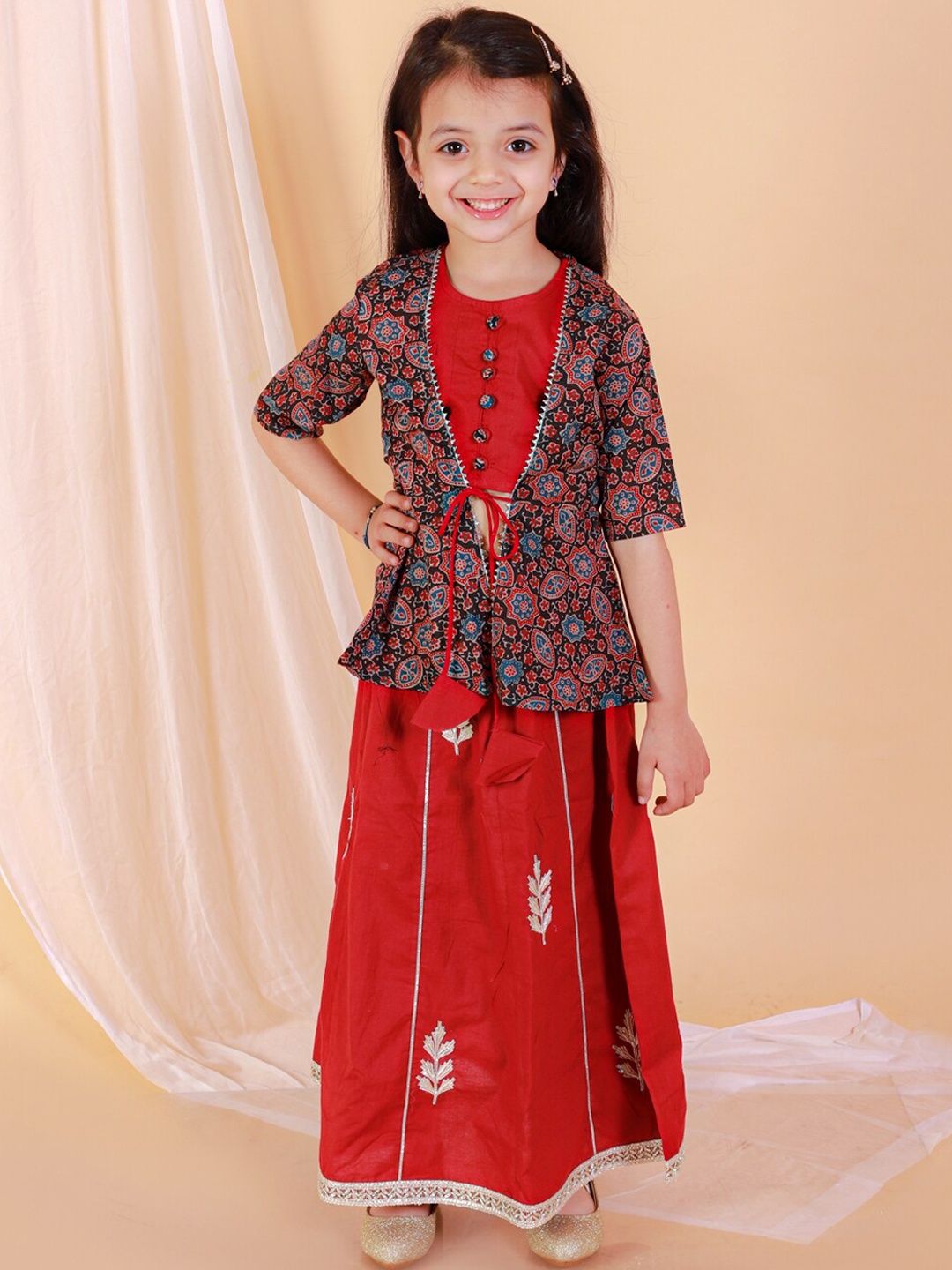 BAESD Girls Ajrakh Printed Gotta Patti Pure Cotton Crop Top with Jacket & Skirt, Red
BAESD Girls Ajrakh Printed Gotta Patti Pure Cotton Crop Top with Jacket & Skirt, Red