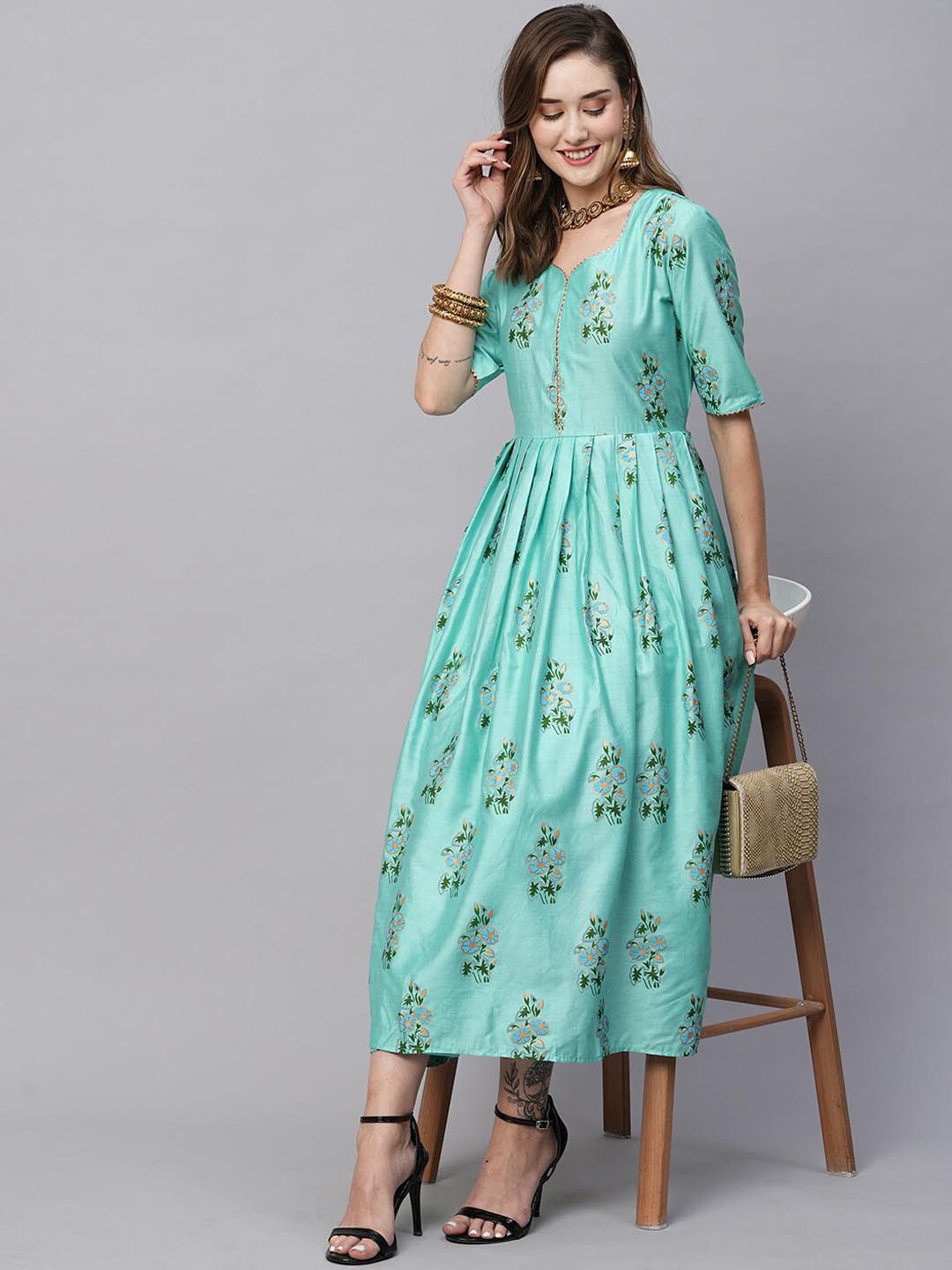 KALINI Women Ethnic Motifs Printed Pleated Kurta with Trousers, Turquoise blue
KALINI Women Ethnic Motifs Printed Pleated Kurta with Trousers, Turquoise blue