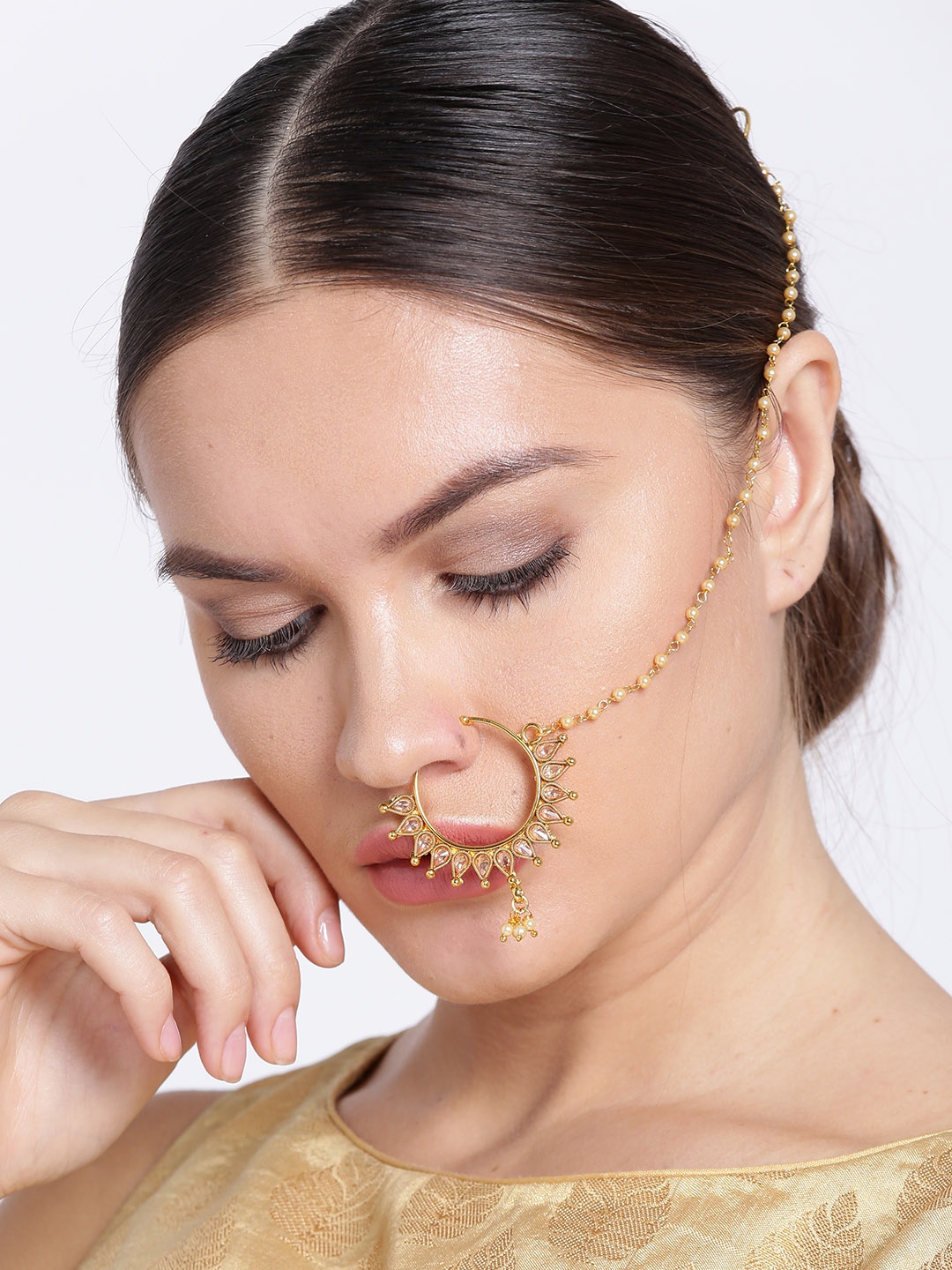 Priyaasi Cream-Coloured Gold-Plated CZ Stone-Studded Handcrafted Nose Ring with Chain
Priyaasi Cream-Coloured Gold-Plated CZ Stone-Studded Handcrafted Nose Ring with Chain