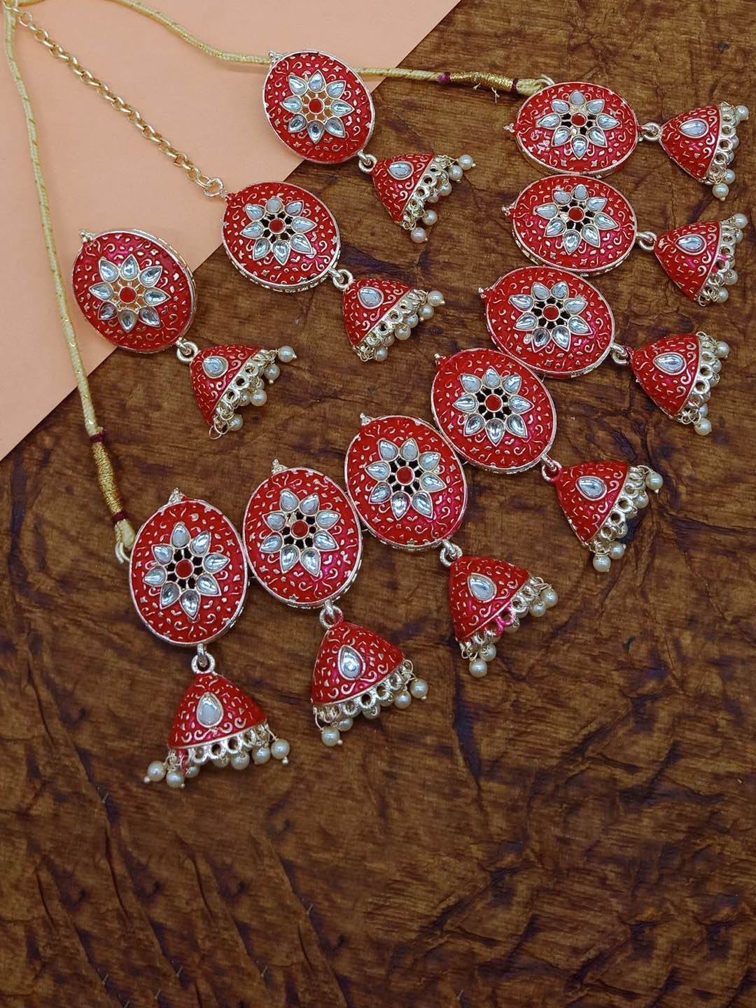 AASHISH IMITATION Gold-Plated Meenakari Enamelled Stone-Studded & Beaded Jewellery Set
AASHISH IMITATION Gold-Plated Meenakari Enamelled Stone-Studded & Beaded Jewellery Set