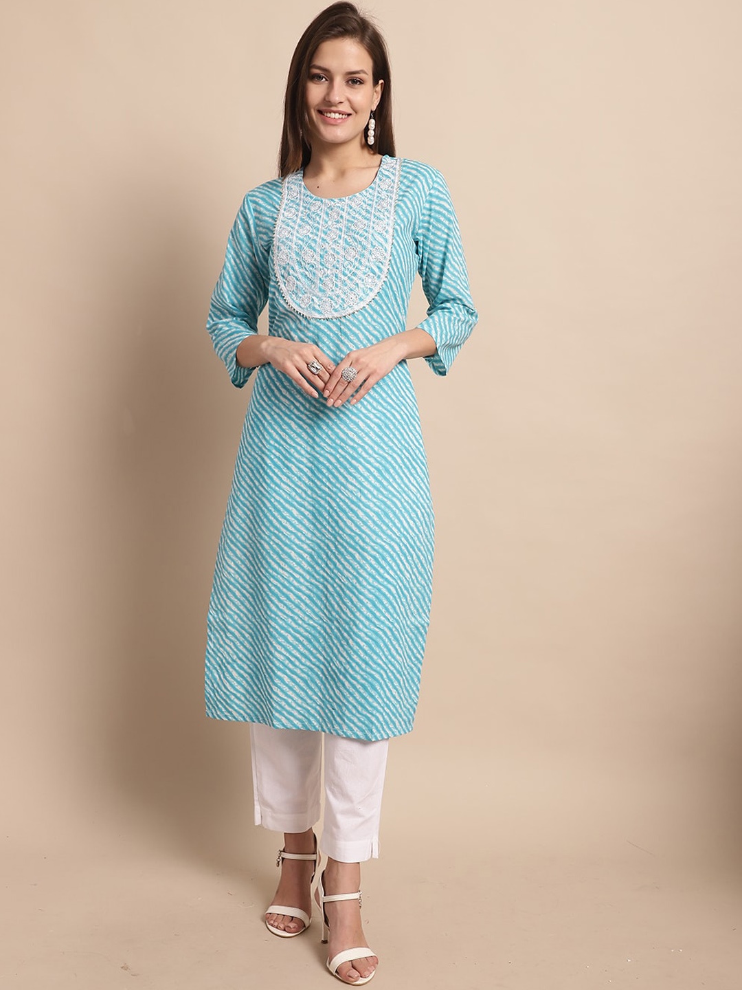 KALINI Women Turquoise Blue Leheriya Embroidered Regular Thread Work Pure Cotton Kurti with Trousers & With
KALINI Women Turquoise Blue Leheriya Embroidered Regular Thread Work Pure Cotton Kurti with Trousers & With