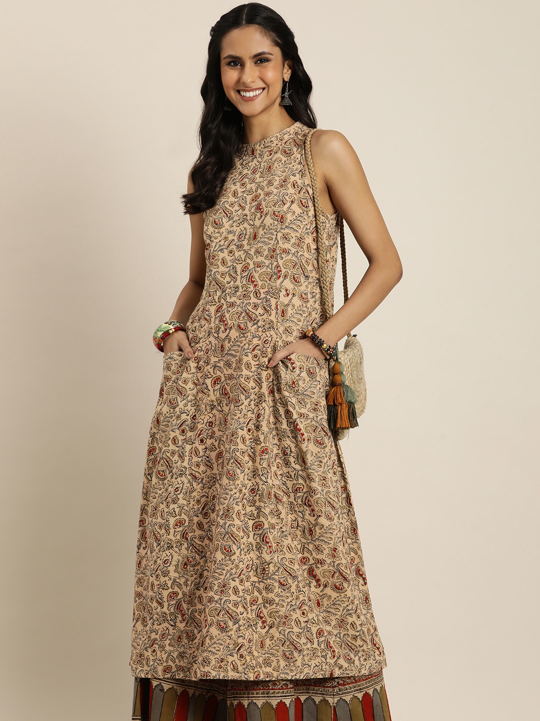 Taavi Pure Cotton Women Ethnic Motifs Printed Regular Kalamkari Kurta with Palazzos, Beige
Taavi Pure Cotton Women Ethnic Motifs Printed Regular Kalamkari Kurta with Palazzos, Beige