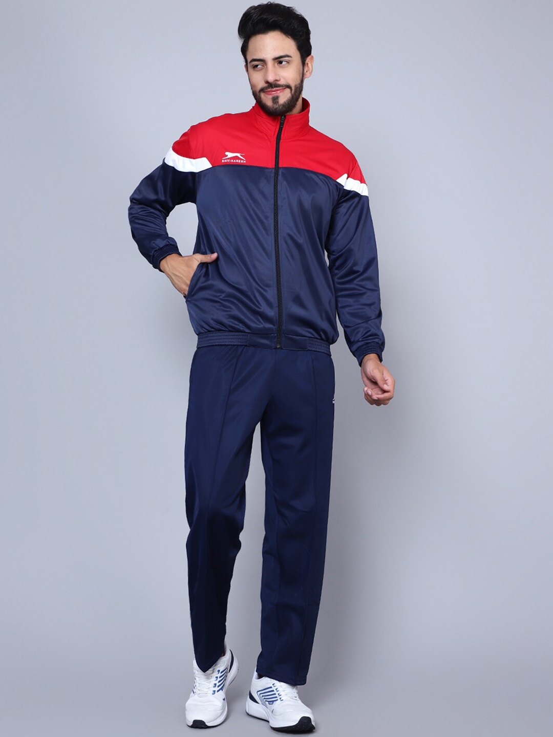 Shiv Naresh Men Colourblocked & Brand Logo Printed Detail Sports Tracksuits, Navy blue
Shiv Naresh Men Colourblocked & Brand Logo Printed Detail Sports Tracksuits, Navy blue