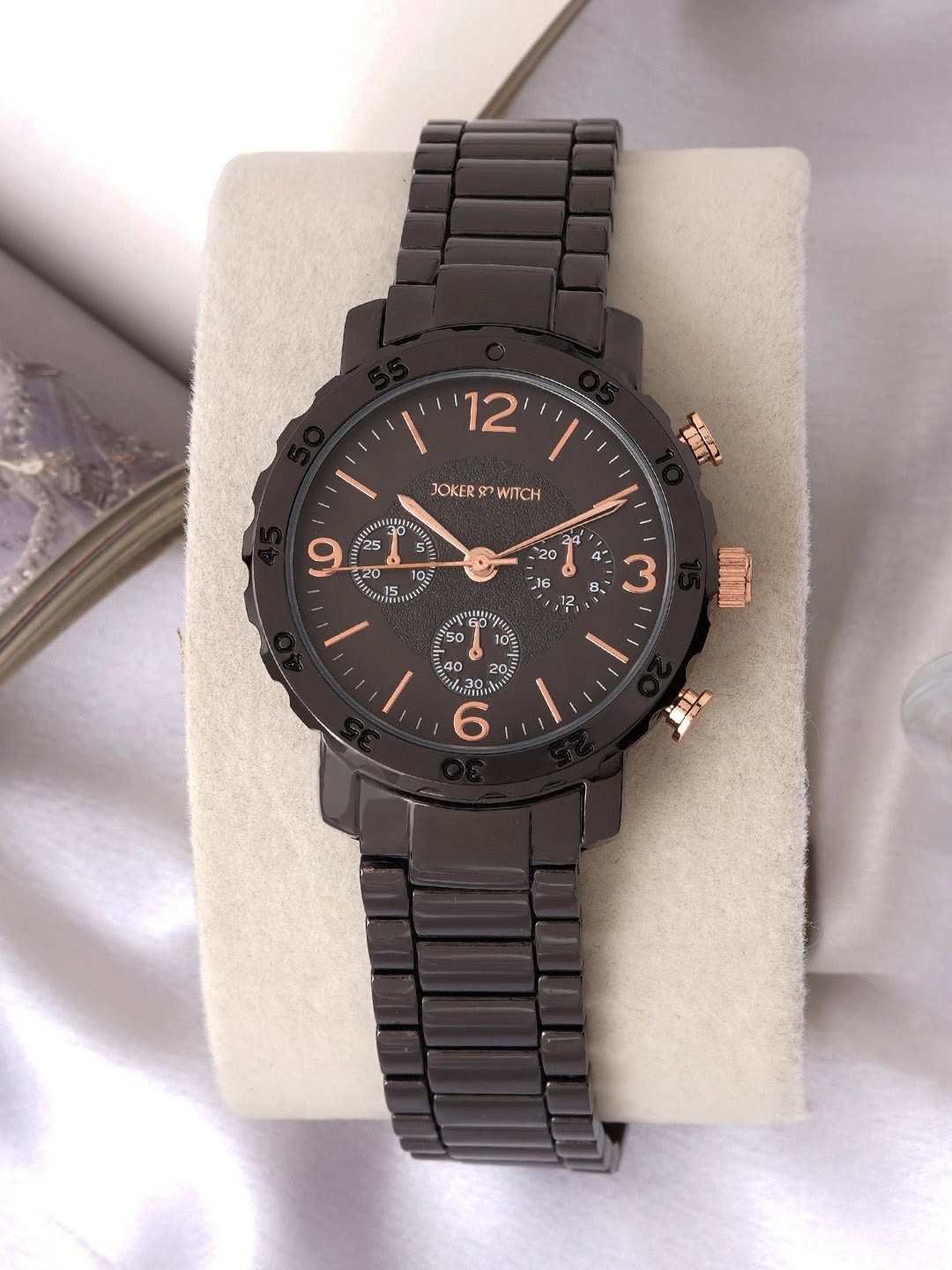 JOKER & WITCH Women Embellished Dial & Bracelet Style Straps Analogue Watch AMWW690, Black
JOKER & WITCH Women Embellished Dial & Bracelet Style Straps Analogue Watch AMWW690, Black
