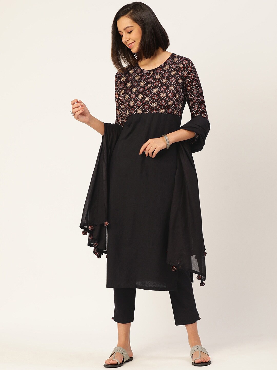 KALINI Floral Yoke Design Beads and Stones Pure Cotton Kurta with Trousers & With Dupatta, Black
KALINI Floral Yoke Design Beads and Stones Pure Cotton Kurta with Trousers & With Dupatta, Black