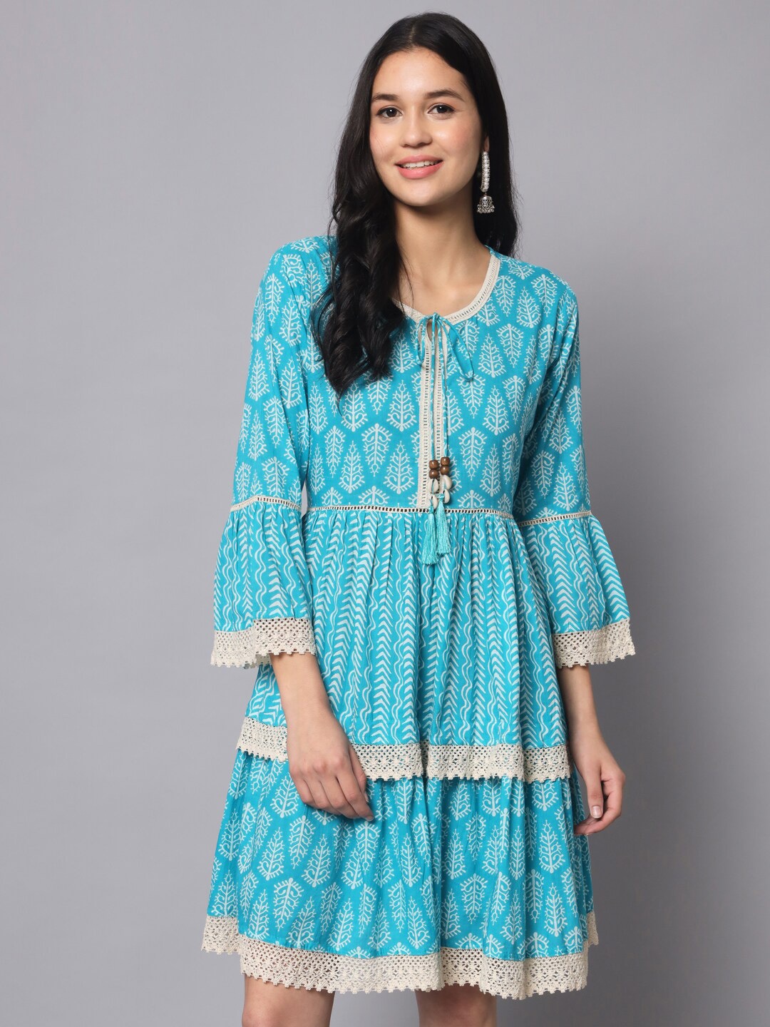KALINI Ethnic Motifs Printed Tie-Up Neck Bell Sleeves Cotton Fit & Flare Dress, Turquoise blue
KALINI Ethnic Motifs Printed Tie-Up Neck Bell Sleeves Cotton Fit & Flare Dress, Turquoise blue