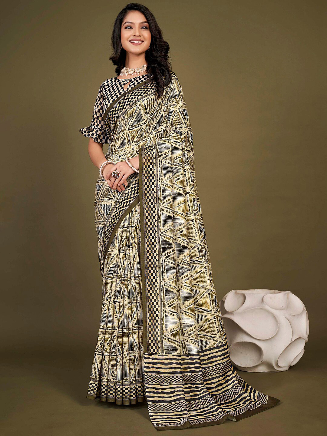 Mitera Cream-Coloured Black Geometric Printed Silk Bagh Saree
Mitera Cream-Coloured Black Geometric Printed Silk Bagh Saree