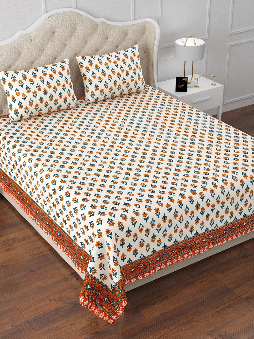 Aapno Rajasthan White & Orange Floral 120 TC Cotton King Bedsheet & 2 Pillow Covers
Aapno Rajasthan White & Orange Floral 120 TC Cotton King Bedsheet & 2 Pillow Covers