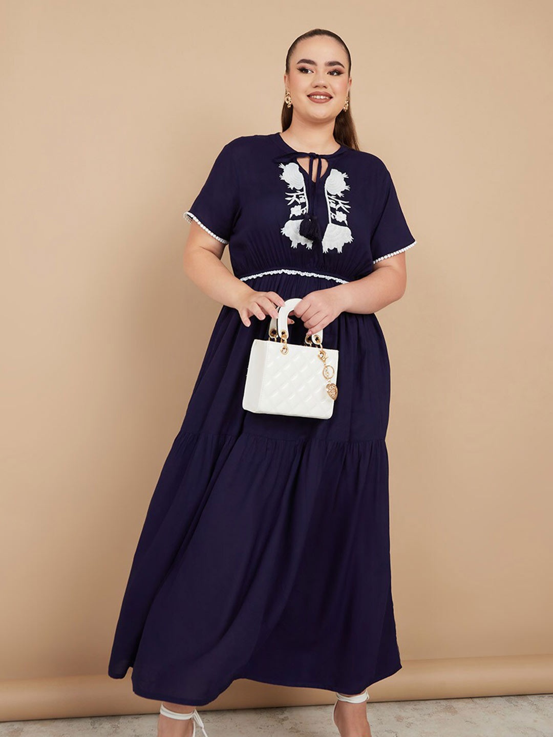 Styli Plus Size Navy Blue And White Embroidered Tie-Up Neck Gathered Tiered Maxi Dress
Styli Plus Size Navy Blue And White Embroidered Tie-Up Neck Gathered Tiered Maxi Dress