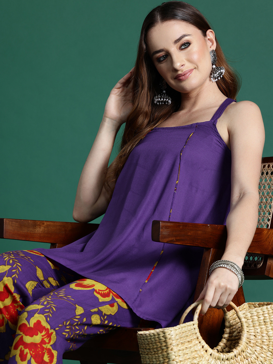 Sangria Shoulder Straps High Low Kurta with Floral Printed Trousers Set, Purple
Sangria Shoulder Straps High Low Kurta with Floral Printed Trousers Set, Purple
