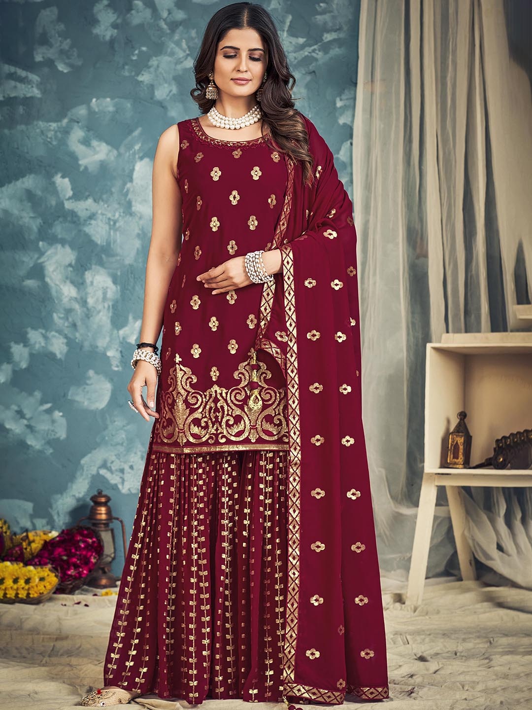 DRESSTIVE Ethnic Motifs Embroidered Regular Sequinned Kurta with Sharara & Dupatta, Red
DRESSTIVE Ethnic Motifs Embroidered Regular Sequinned Kurta with Sharara & Dupatta, Red