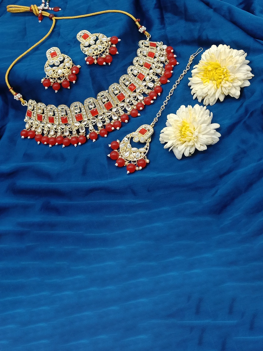 AASHISH IMITATION Gold-Plated Kundan-Studded & Beaded Necklace & Earrings With Maangtika
AASHISH IMITATION Gold-Plated Kundan-Studded & Beaded Necklace & Earrings With Maangtika