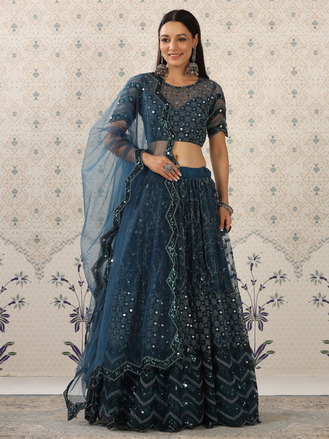 Ode by House of Pataudi Blue & Silver-Toned Semi-Stitched Lehenga & Unstitched Blouse
Ode by House of Pataudi Blue & Silver-Toned Semi-Stitched Lehenga & Unstitched Blouse